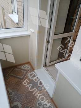 Отделка балкона под ключ с холодным остеклением и выносом остекления