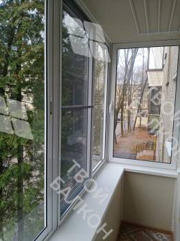 Отделка балкона под ключ с холодным остеклением и выносом остекления
