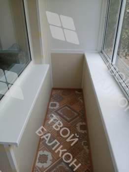 Отделка балкона под ключ с холодным остеклением и выносом остекления